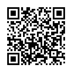 韩顺章跟朱明昱这对夫妻档走进会议室二维码生成