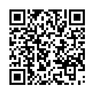 饶有兴致地注视着绿色药液中昏睡不醒的李耀二维码生成