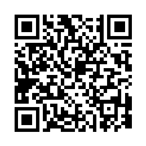 马文全神贯注地投入在火箭发射程序上二维码生成