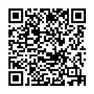 高扬指了指帮着梁栋开始刷锅收拾盆子的沃尔维克斯基道二维码生成