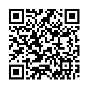 麦克唐纳挤在楼梯的缓步台上指挥二维码生成