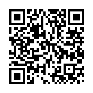 龙羽站在秦依雪的书架前翻阅着资料二维码生成