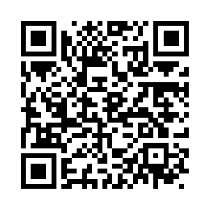 龙野的眼睛里燃烧着不屈不挠的战意二维码生成